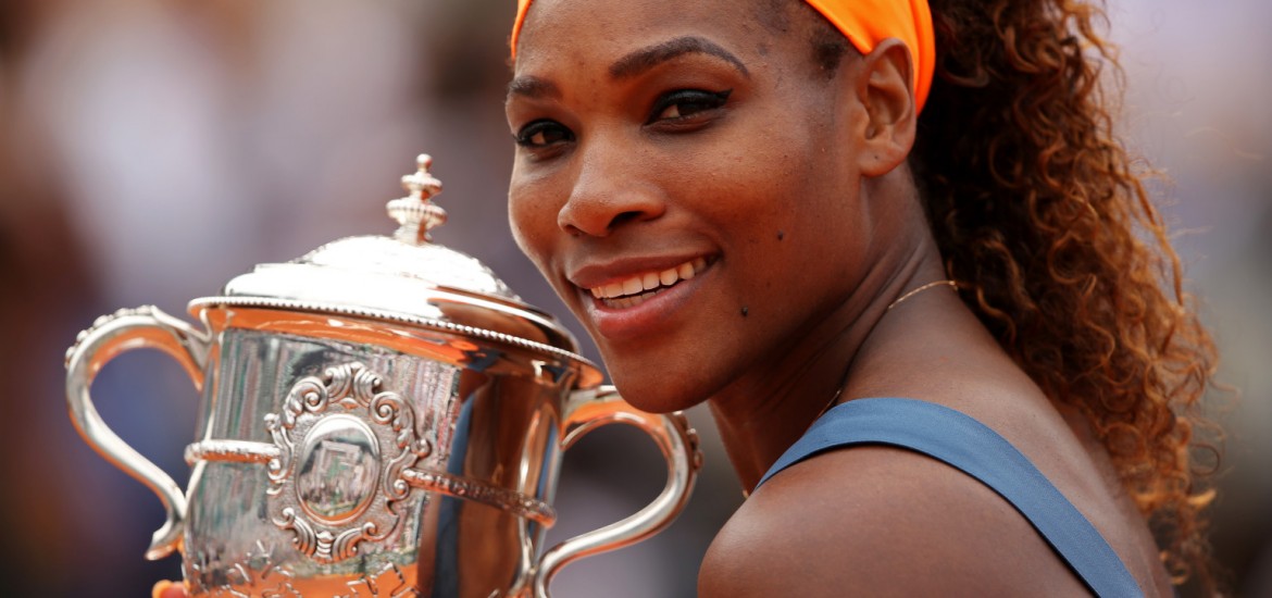 PARIS, FRANCE - JUNE 08: Serena Williams of United States of America poses with the Coupe Suzanne Lenglen after victory in the Women's Singles Final match against Maria Sharapova of Russia during day fourteen of French Open at Roland Garros on June 8, 2013 in Paris, France. (Photo by Clive Brunskill/Getty Images)
